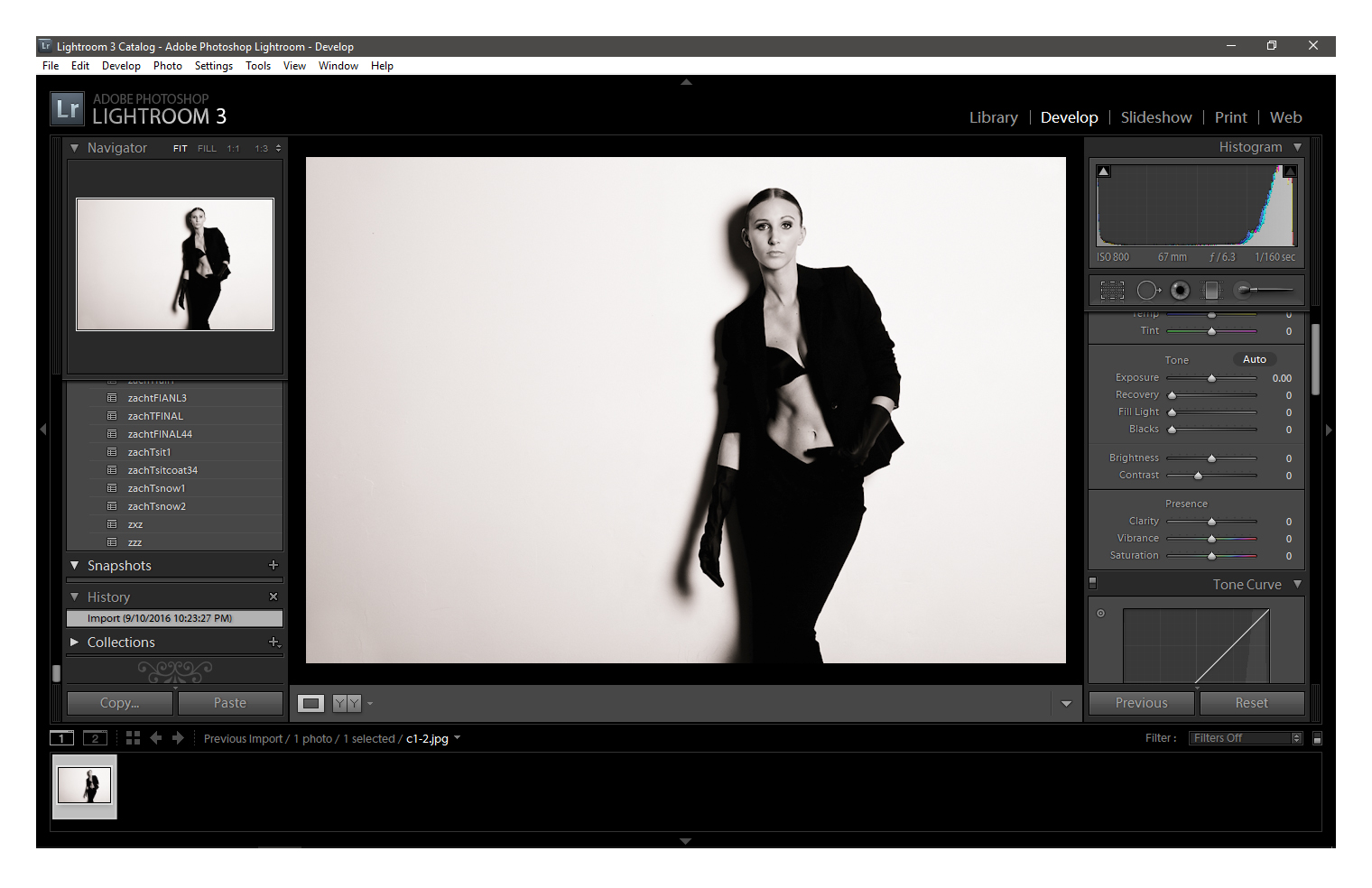 A screenshot of Adobe Photoshop Lightroom software being used to edit a photograph of a woman model with pulled-back black hair wearing an all black outfit with gloves