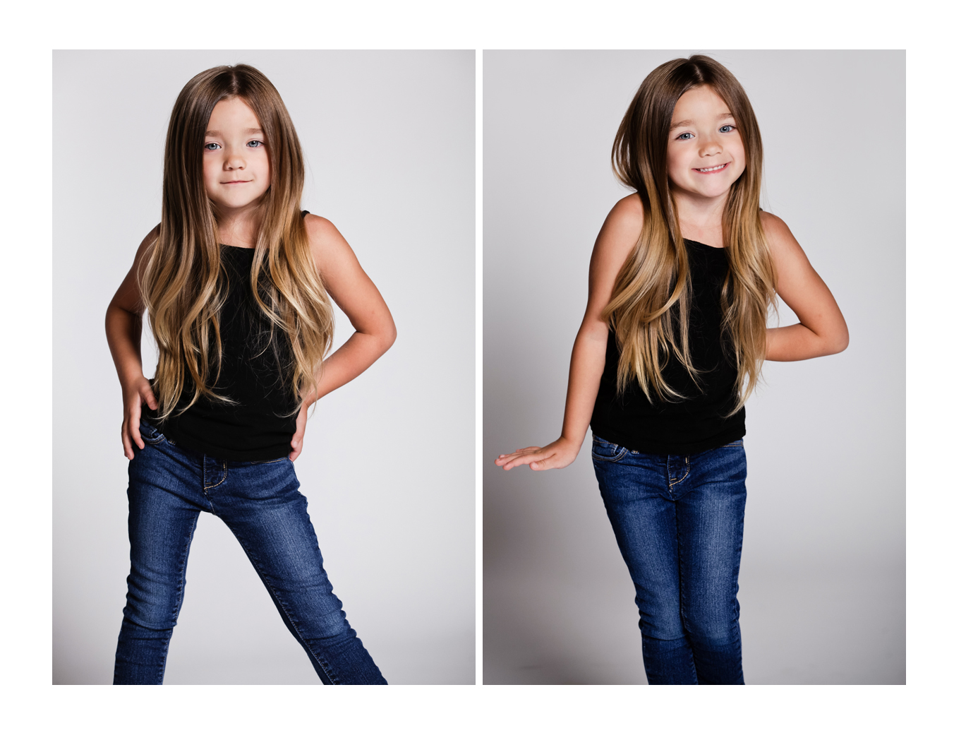 A young girl models with a smile facing the photographer wearing a black top and blue jeans while her wavy blonde hair cascades over her shoulders